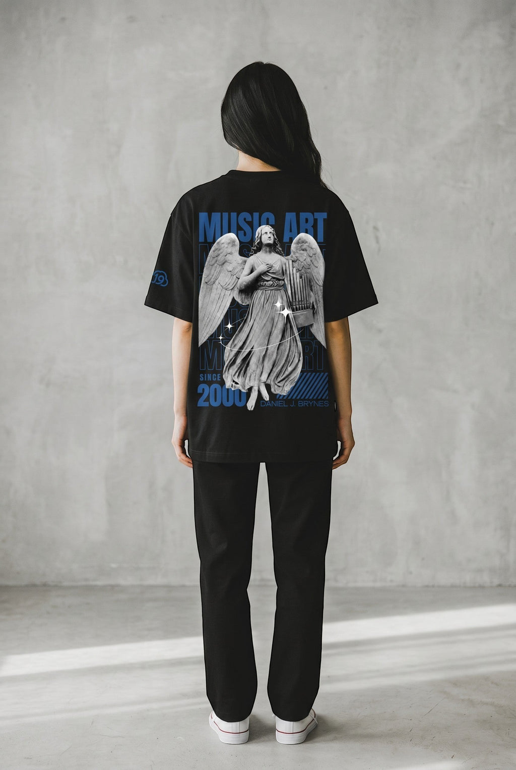 Cloud 19 Official Streetwear Malaysia black oversized 100% cotton t-shirt with angel graphic and blue text.